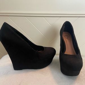 Black suede platform heels